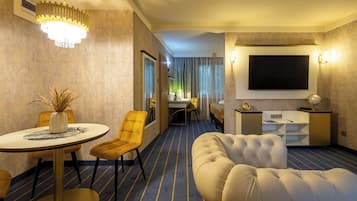 Standard Suite, 1 King Bed | Living room | LCD TV