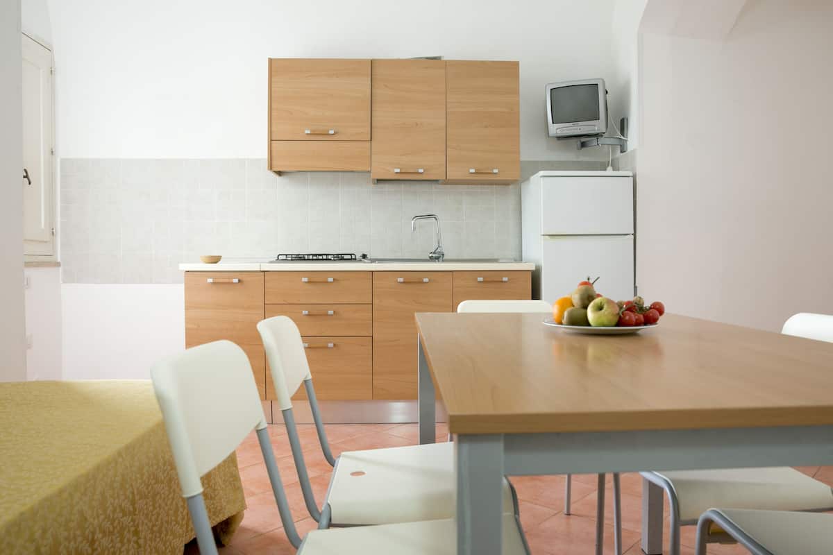 Deluxe Suite | Living area | TV