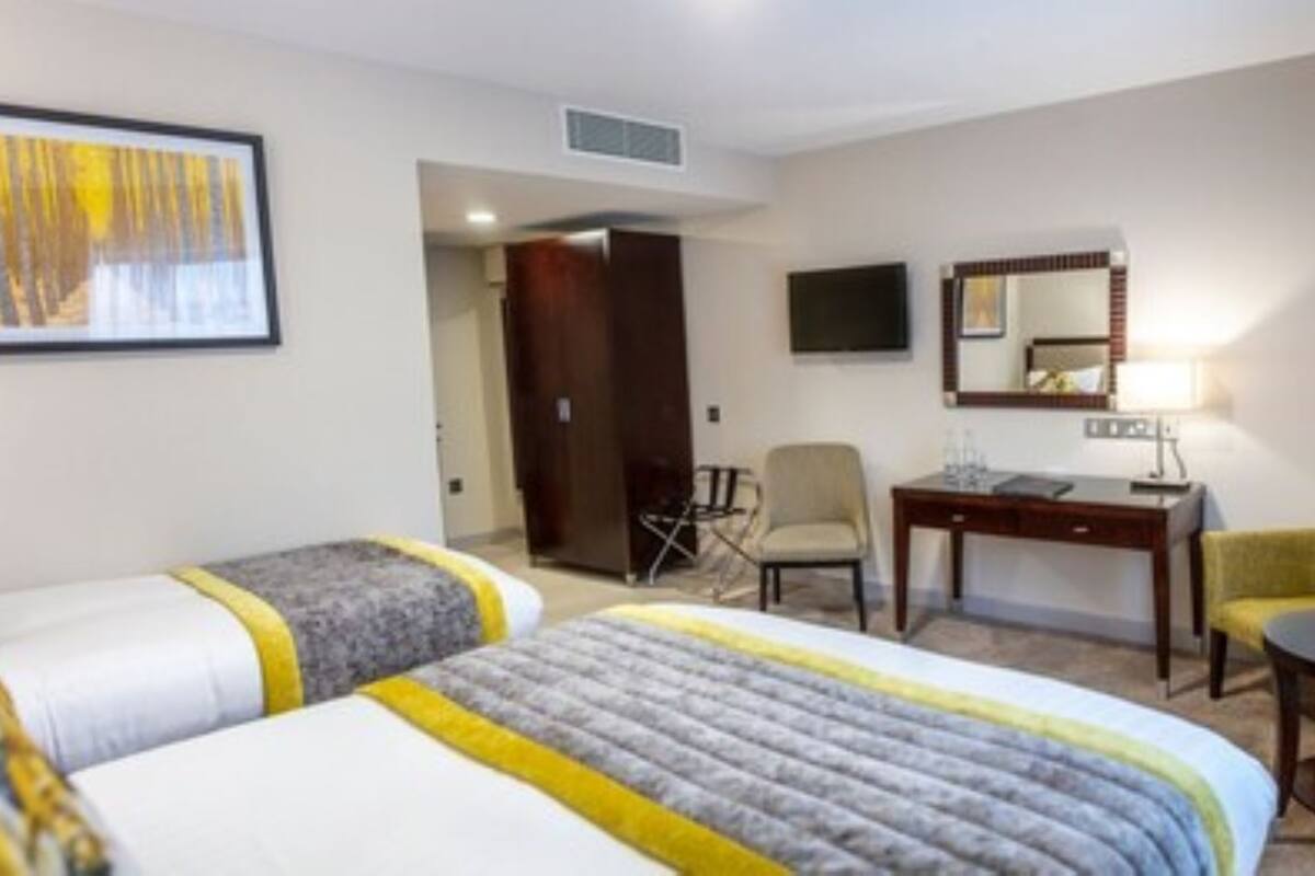 hypo-allergenic bedding, select comfort beds, in-room safe, desk