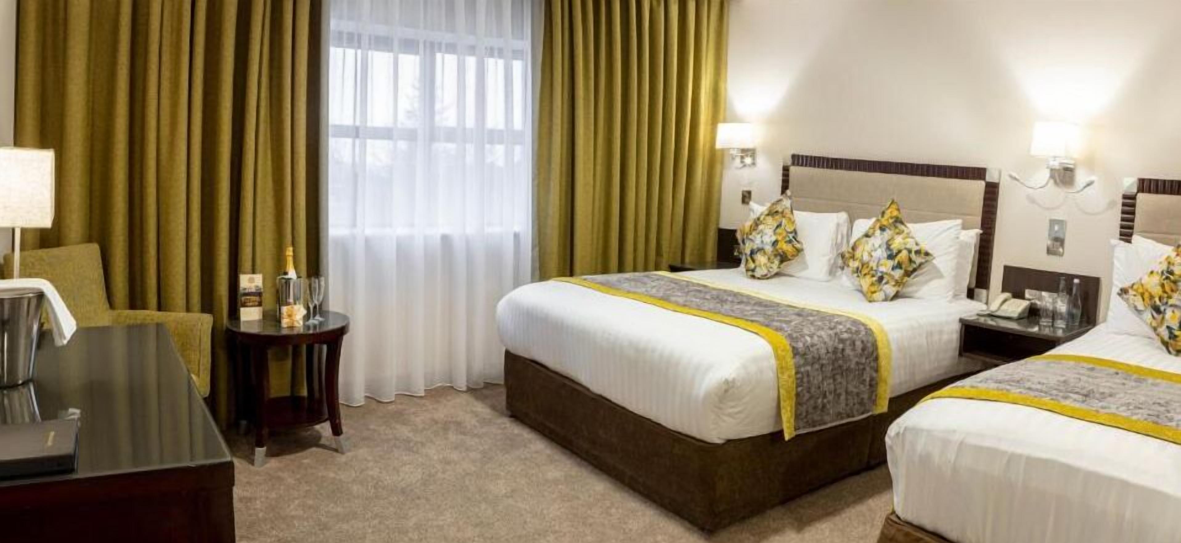 hypo-allergenic bedding, select comfort beds, in-room safe, desk