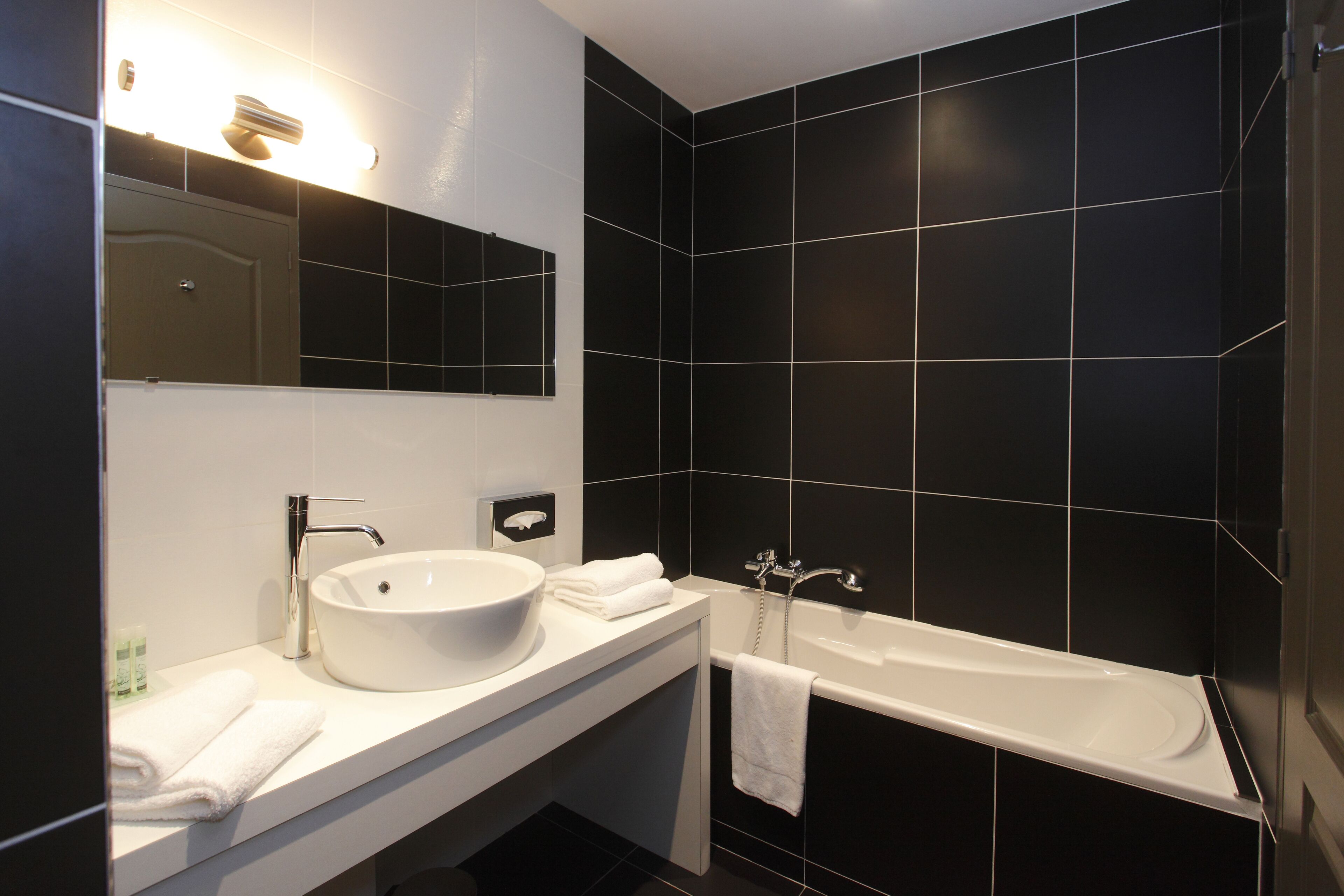 superior room, annex building | bathroom | hair dryer, towels, soap, shampoo