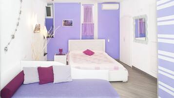 Standard-Suite, 1 Schlafzimmer, Kochnische | Zimmersafe, Zustellbetten, kostenloses WLAN, Bettwäsche