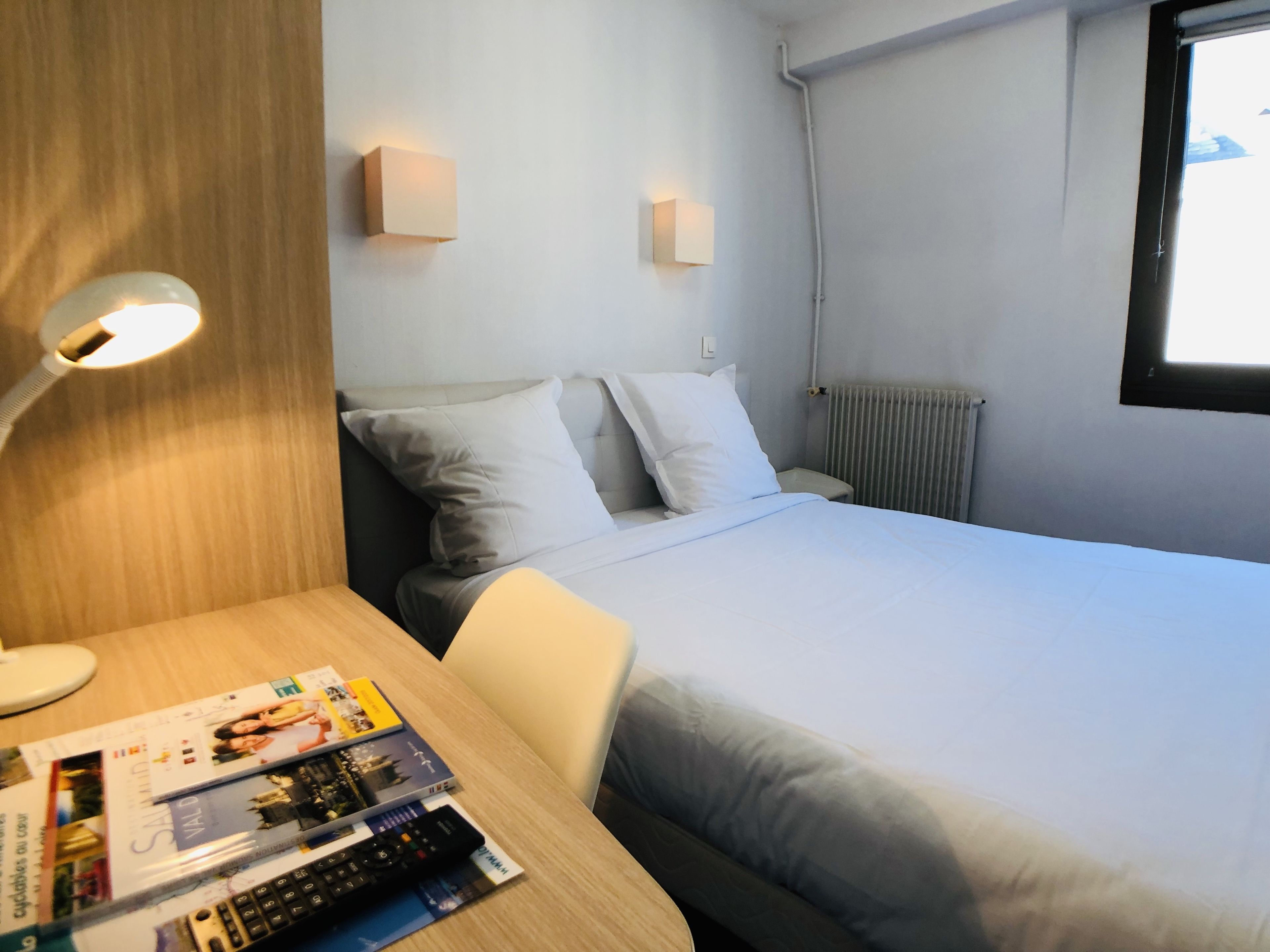 economy double room | desk, iron/ironing board, free cots/infant beds, rollaway beds