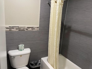 Room, 1 King Bed, Smoking | Bathroom | Free toiletries, hair dryer, towels