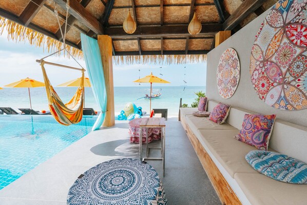 Outdoor pool, open 7:00 AM to 6:00 PM, pool umbrellas, pool loungers