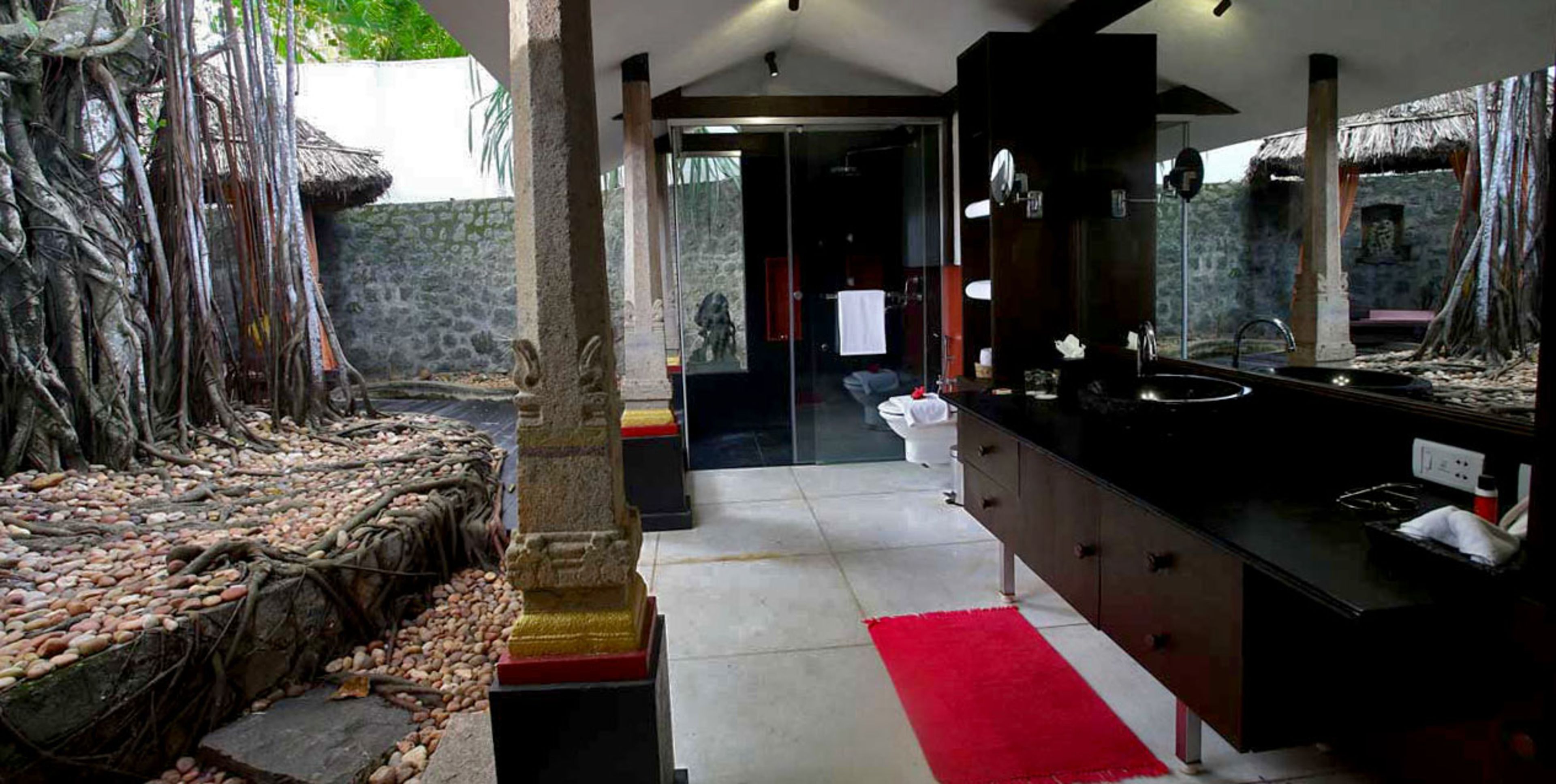 the banyan tree bungalow | bathroom amenities | shower, rainfall showerhead, designer toiletries, hair dryer