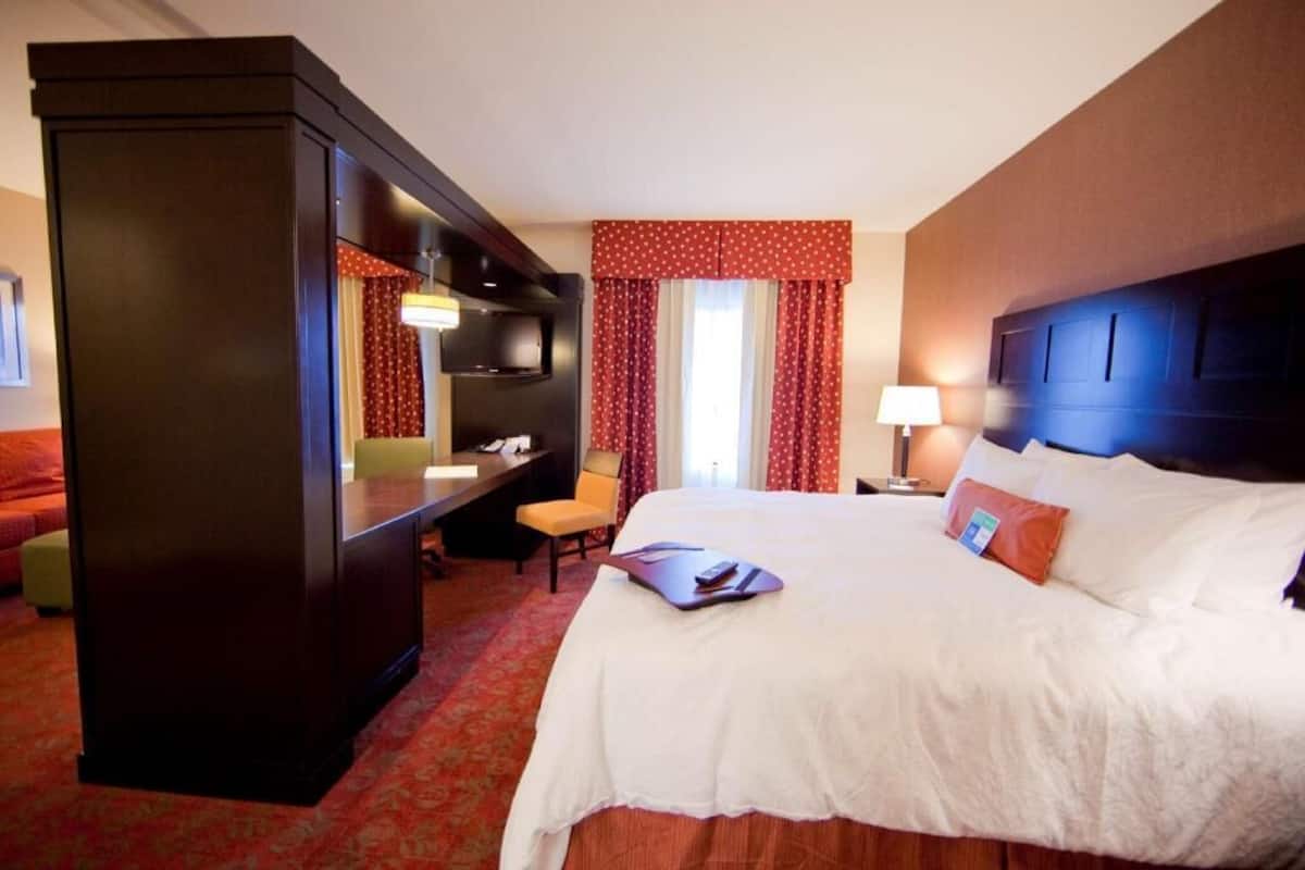 Premium bedding, laptop workspace, blackout drapes, iron/ironing board