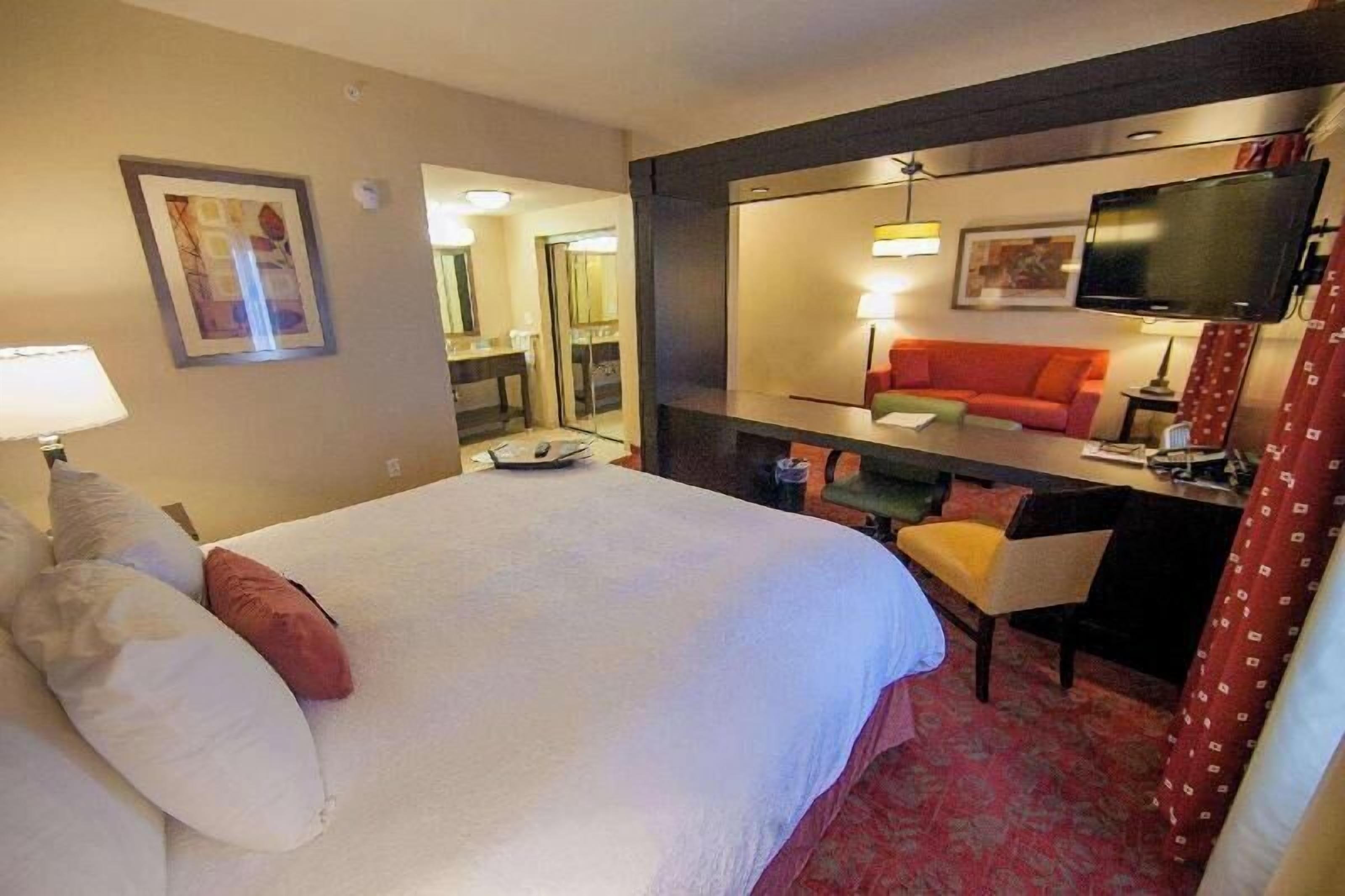 Premium bedding, laptop workspace, blackout drapes, iron/ironing board