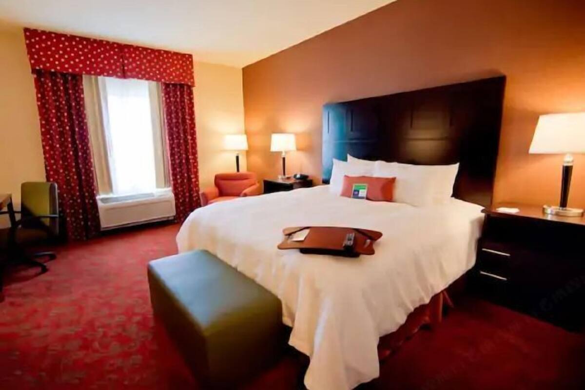 Premium bedding, laptop workspace, blackout drapes, iron/ironing board