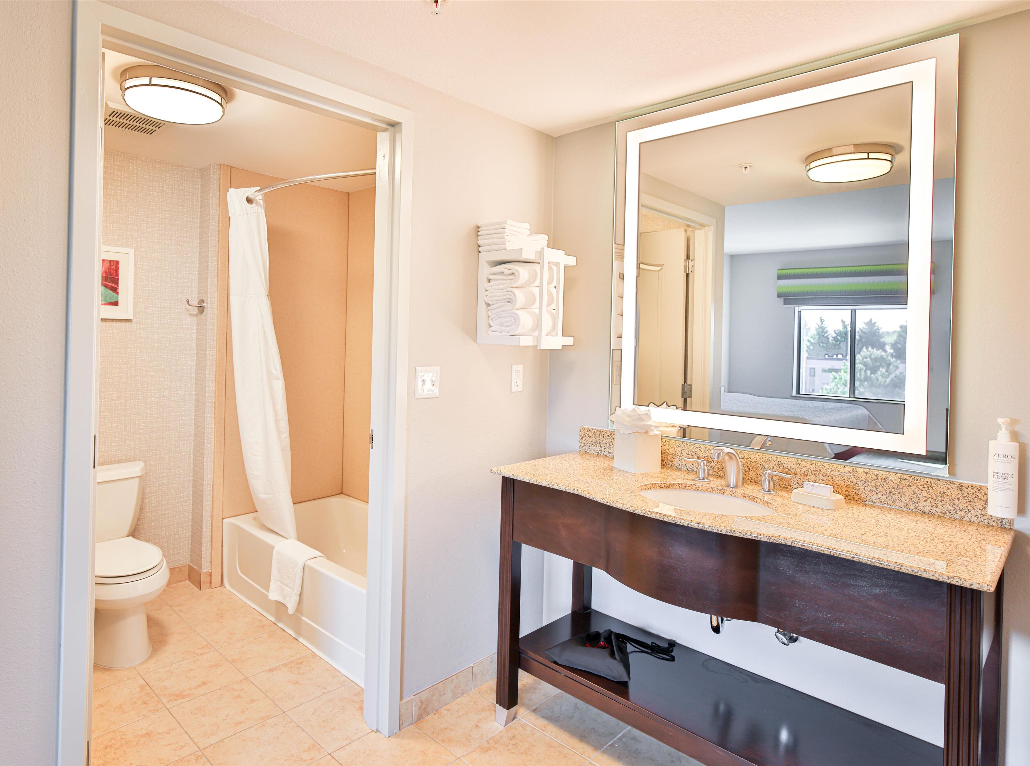 studio suite, one king bed, non-smoking | bathroom | hair dryer, towels, soap, shampoo