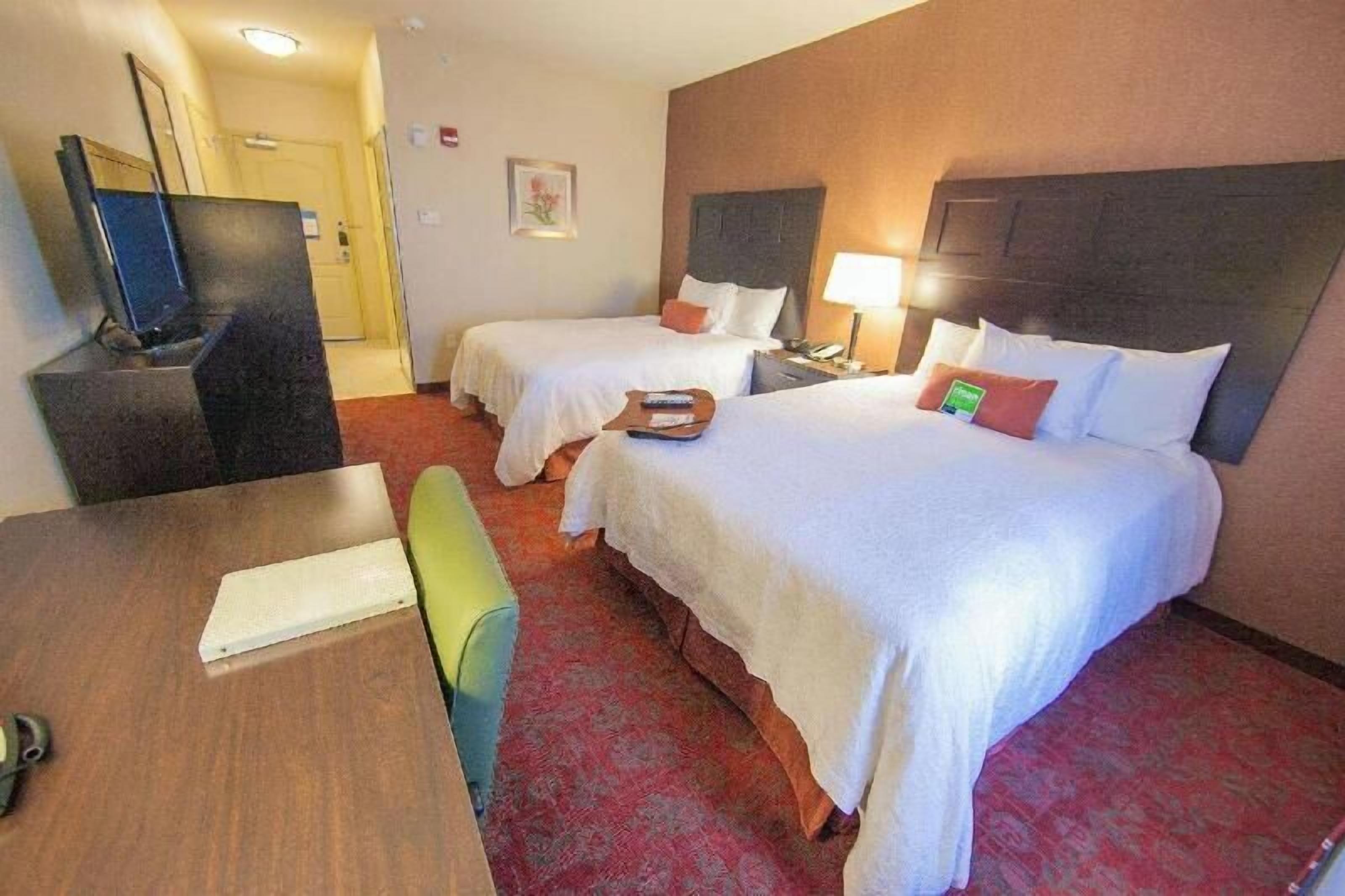 Premium bedding, laptop workspace, blackout drapes, iron/ironing board