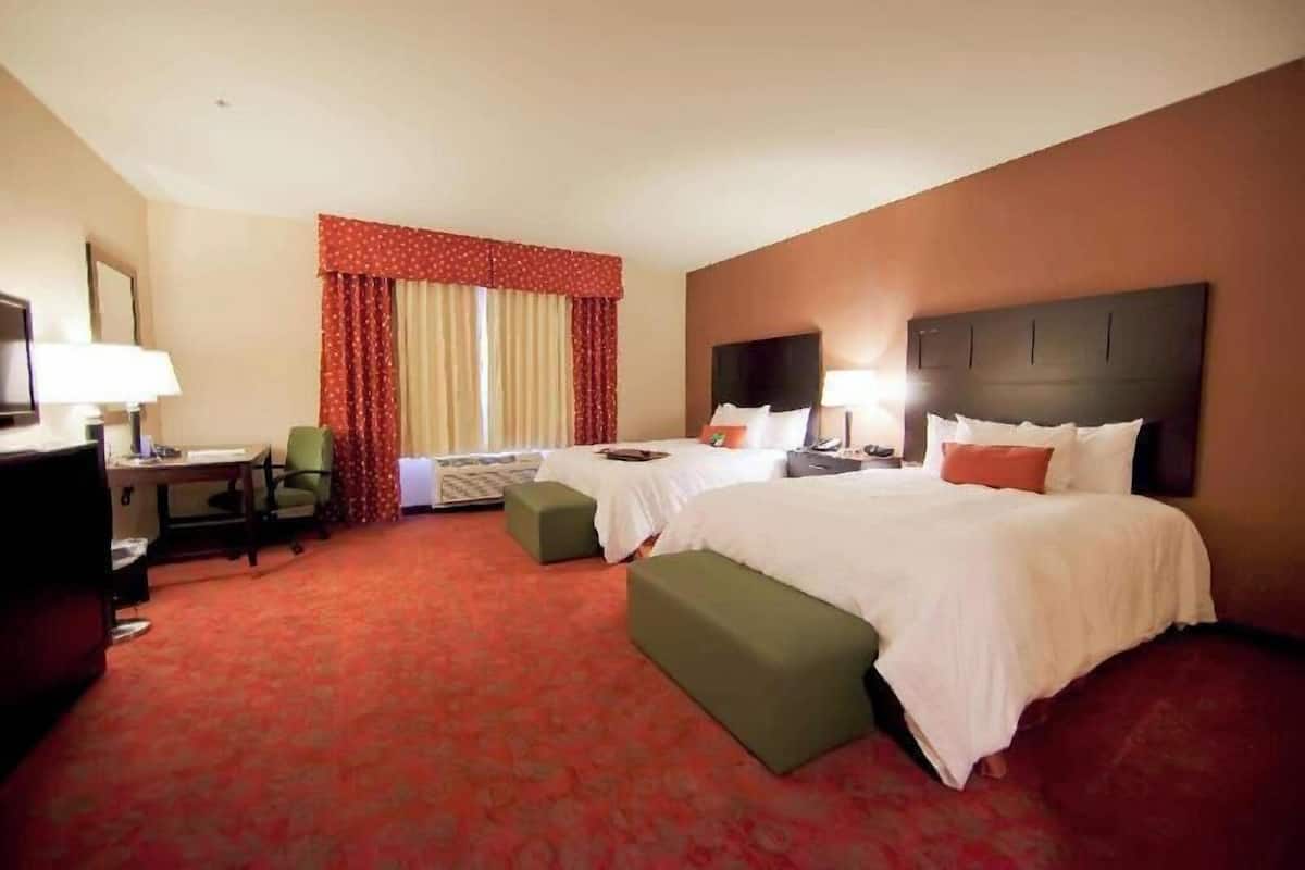 Premium bedding, laptop workspace, blackout drapes, iron/ironing board