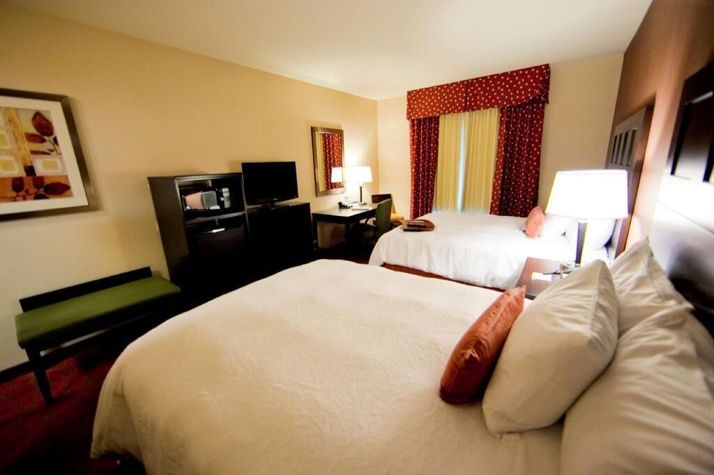 Premium bedding, laptop workspace, blackout drapes, iron/ironing board