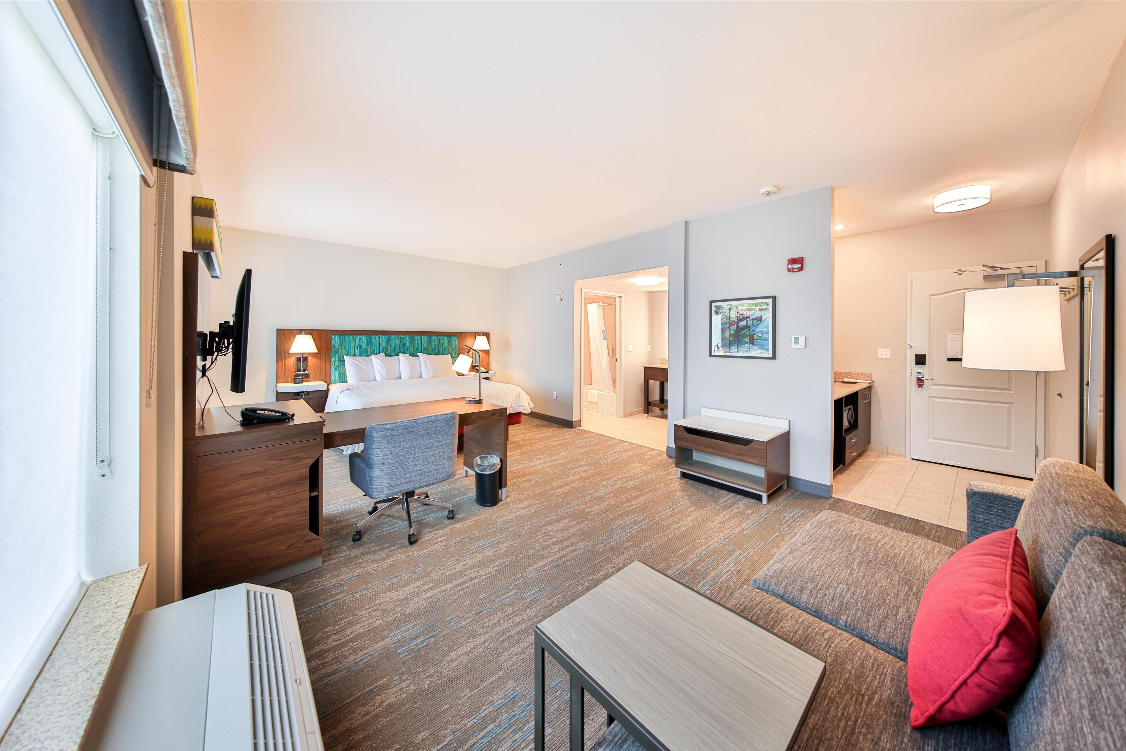 studio suite, one king bed, non-smoking, accessible hearing / visual | living area | 55-inch led tv with cable channels