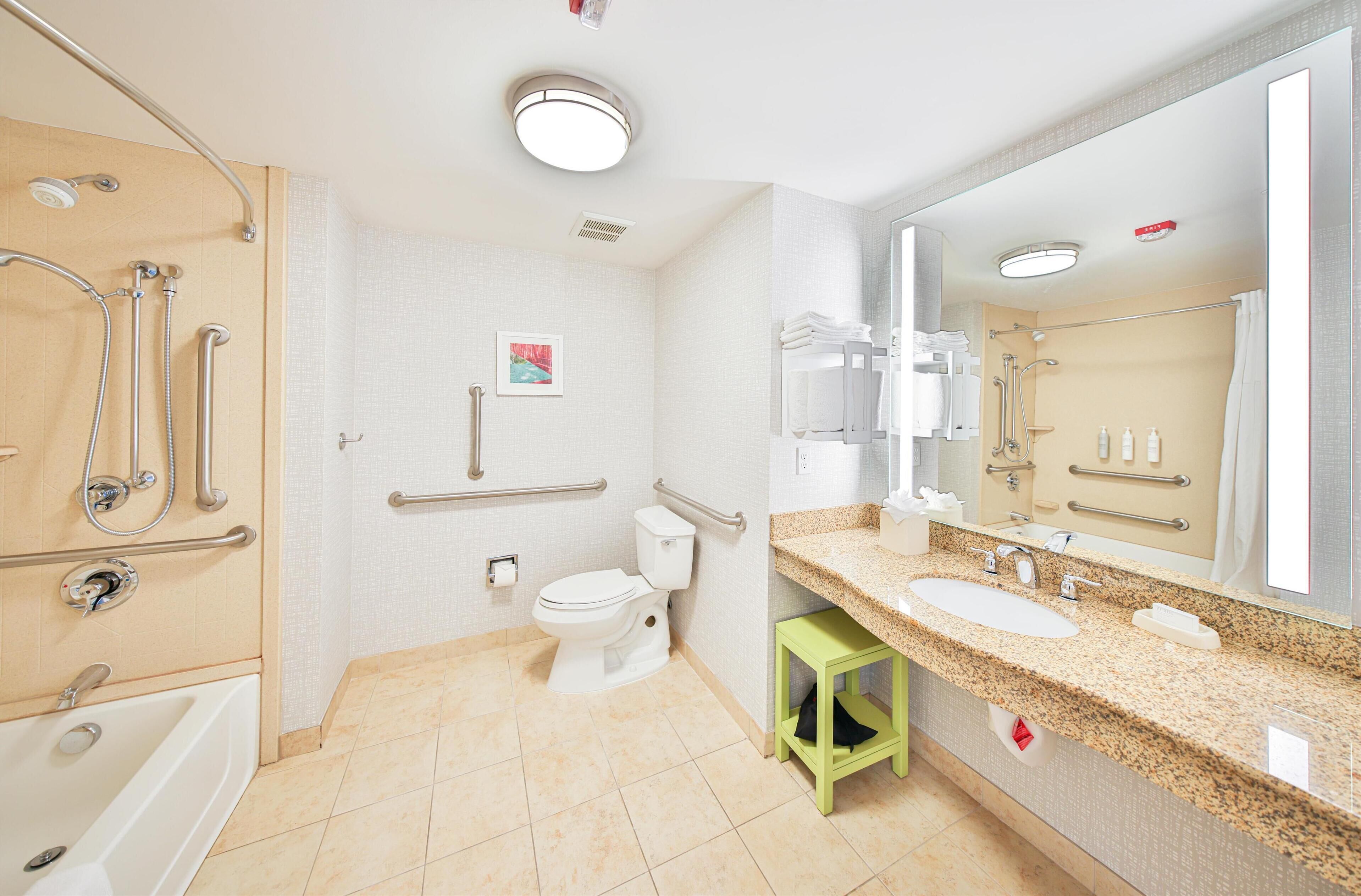 two queen beds, non-smoking, accessible bathtub | bathroom | hair dryer, towels, soap, shampoo