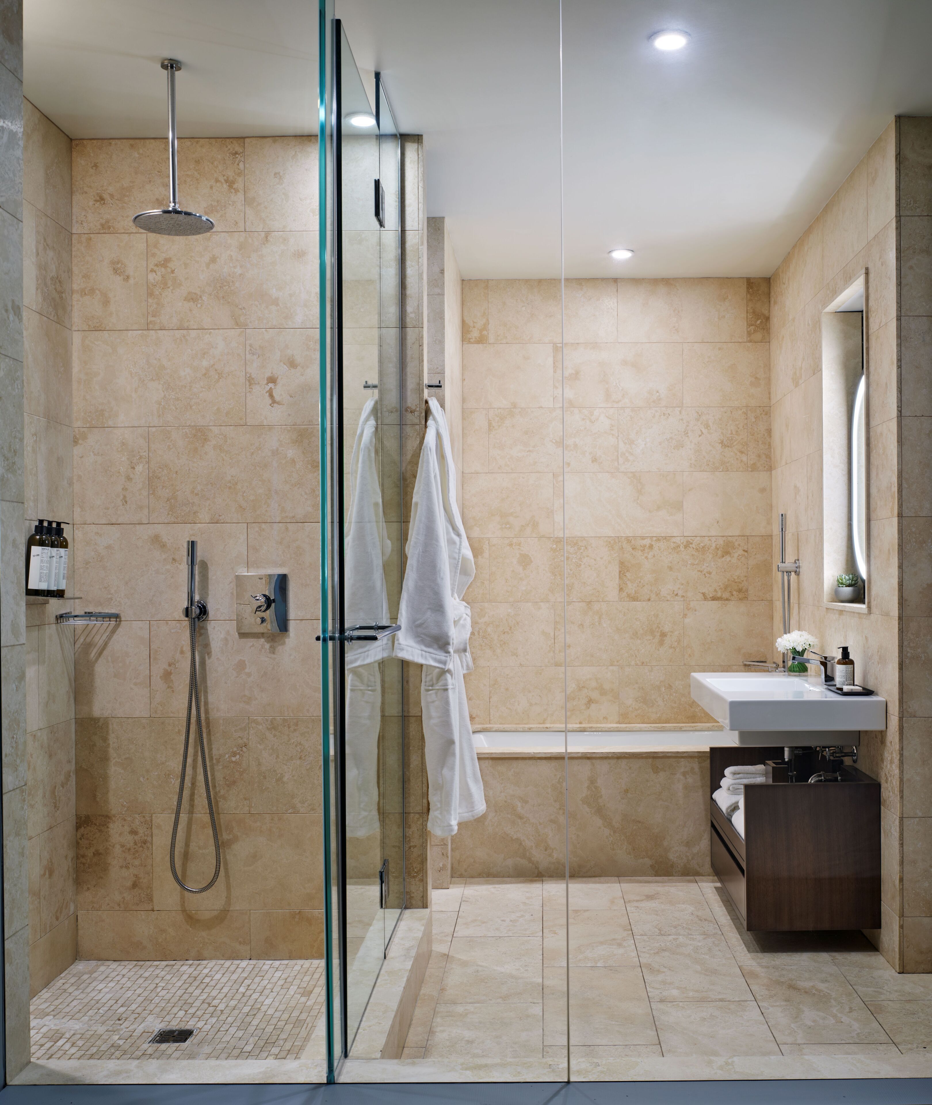 designer toiletries, hair dryer, bathrobes, slippers