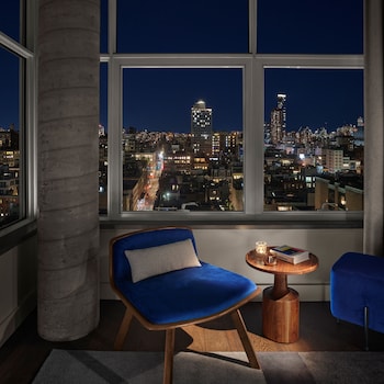 Hotel room view looking out at ModernHaus SoHo