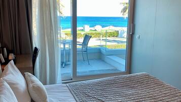 Double Room, Balcony, Sea View | Minibar, in-room safe, desk, free WiFi