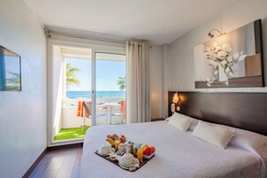 Double Room, Balcony, Sea View | Minibar, in-room safe, desk, free WiFi