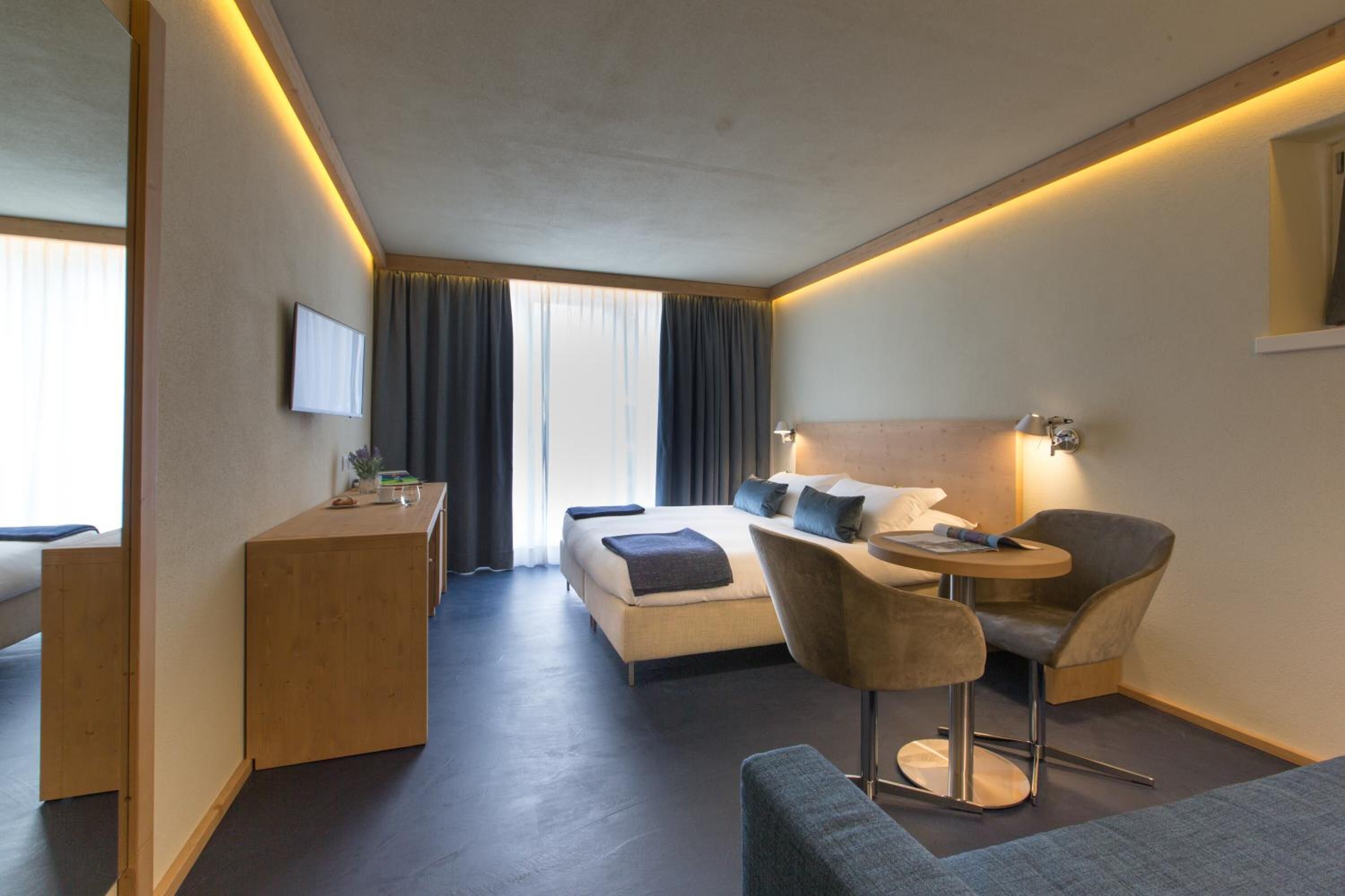 hypo-allergenic bedding, down duvets, minibar, in-room safe