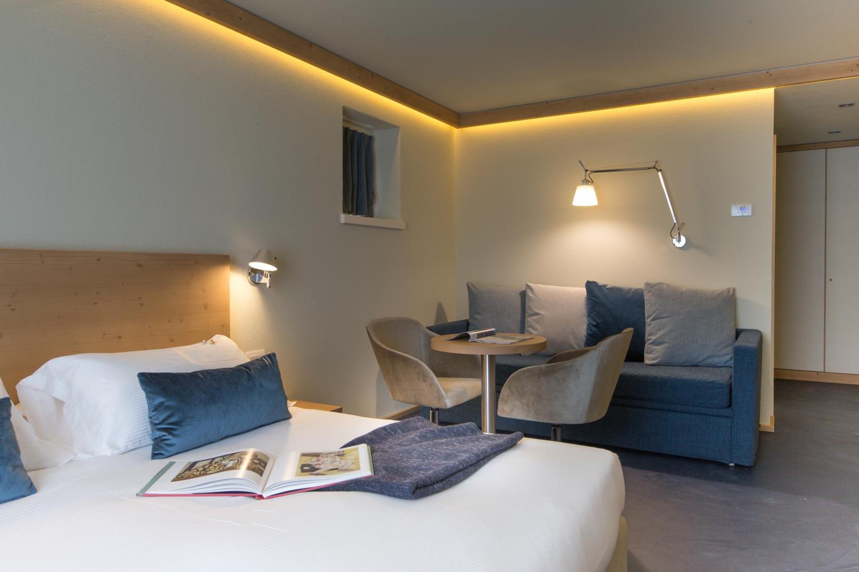 hypo-allergenic bedding, down duvets, minibar, in-room safe