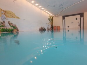 Indoor pool, open 7:30 AM to 7:00 PM, pool umbrellas, sun loungers