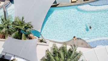2 outdoor pools, open 6:00 AM to 9:00 PM, pool umbrellas, pool loungers