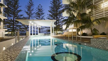 2 outdoor pools, open 6:00 AM to 9:00 PM, pool umbrellas, pool loungers