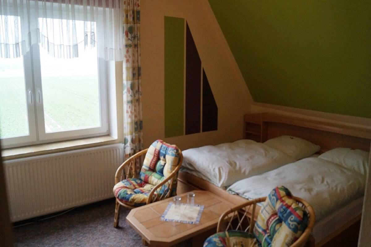 Triple Room, Garden View | Hypo-allergenic bedding available, blackout drapes, cribs (free)