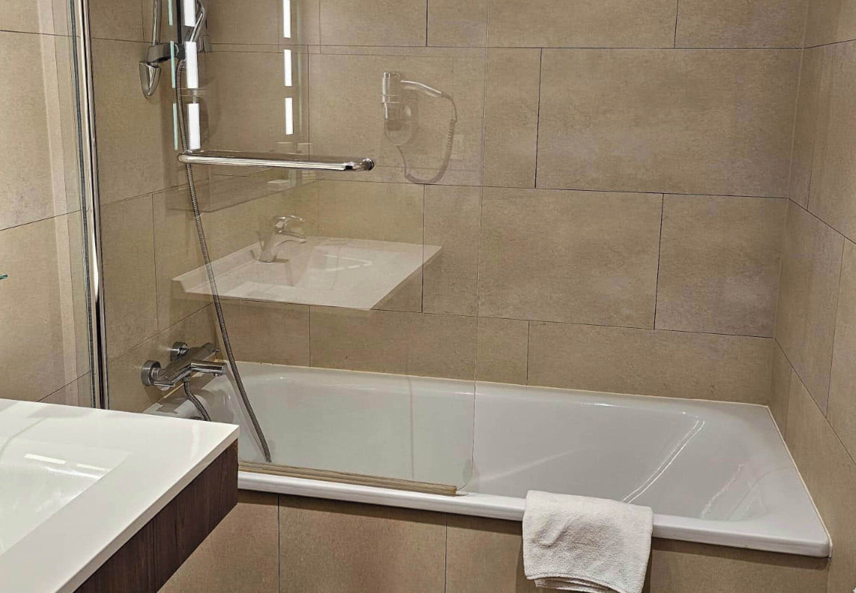 shower, free toiletries, hair dryer, towels