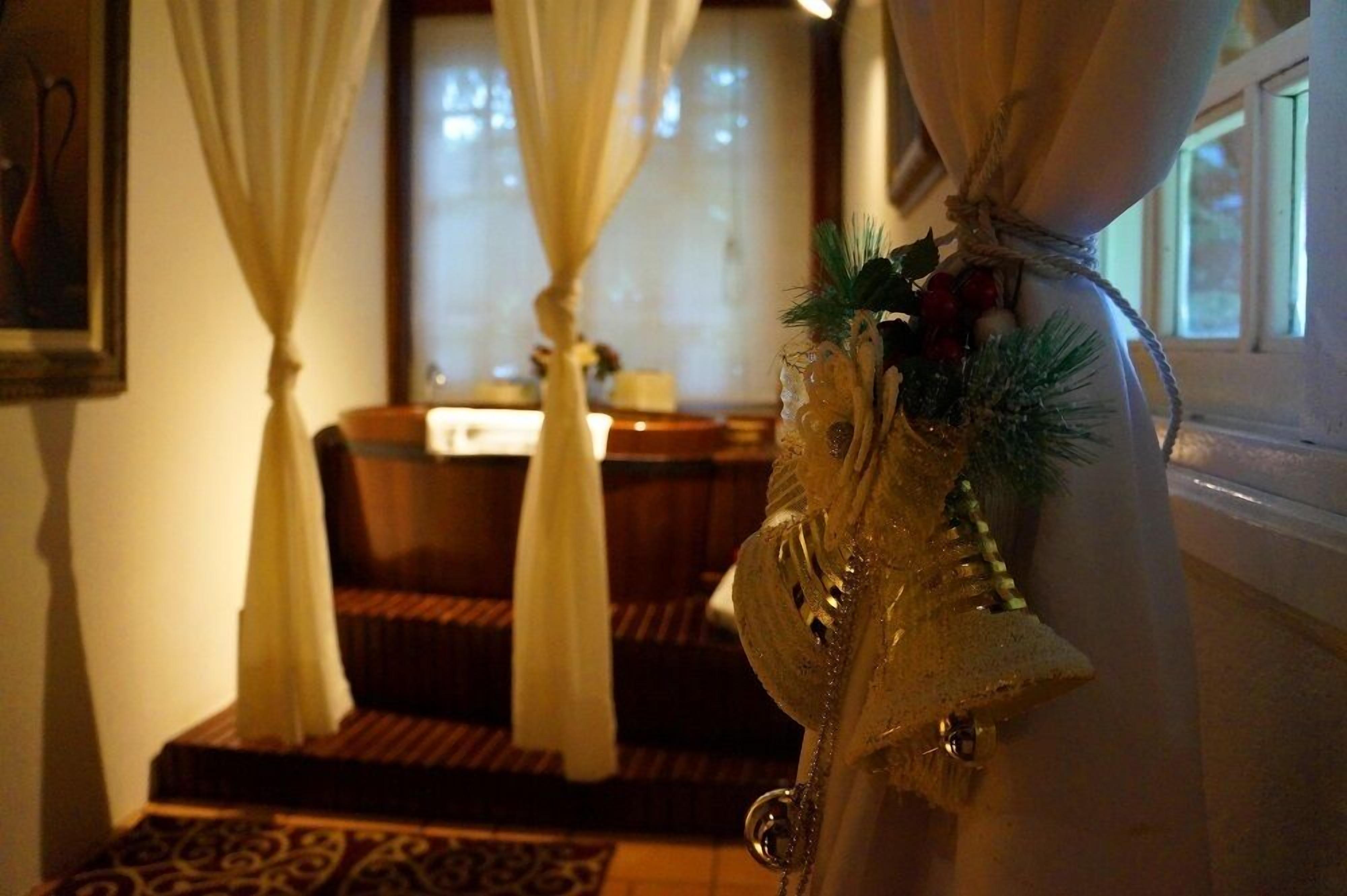 premium suite | bathroom | designer toiletries, hair dryer, bathrobes, slippers