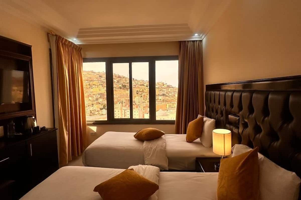 triple room | 1 bedroom, select comfort beds, minibar, in-room safe