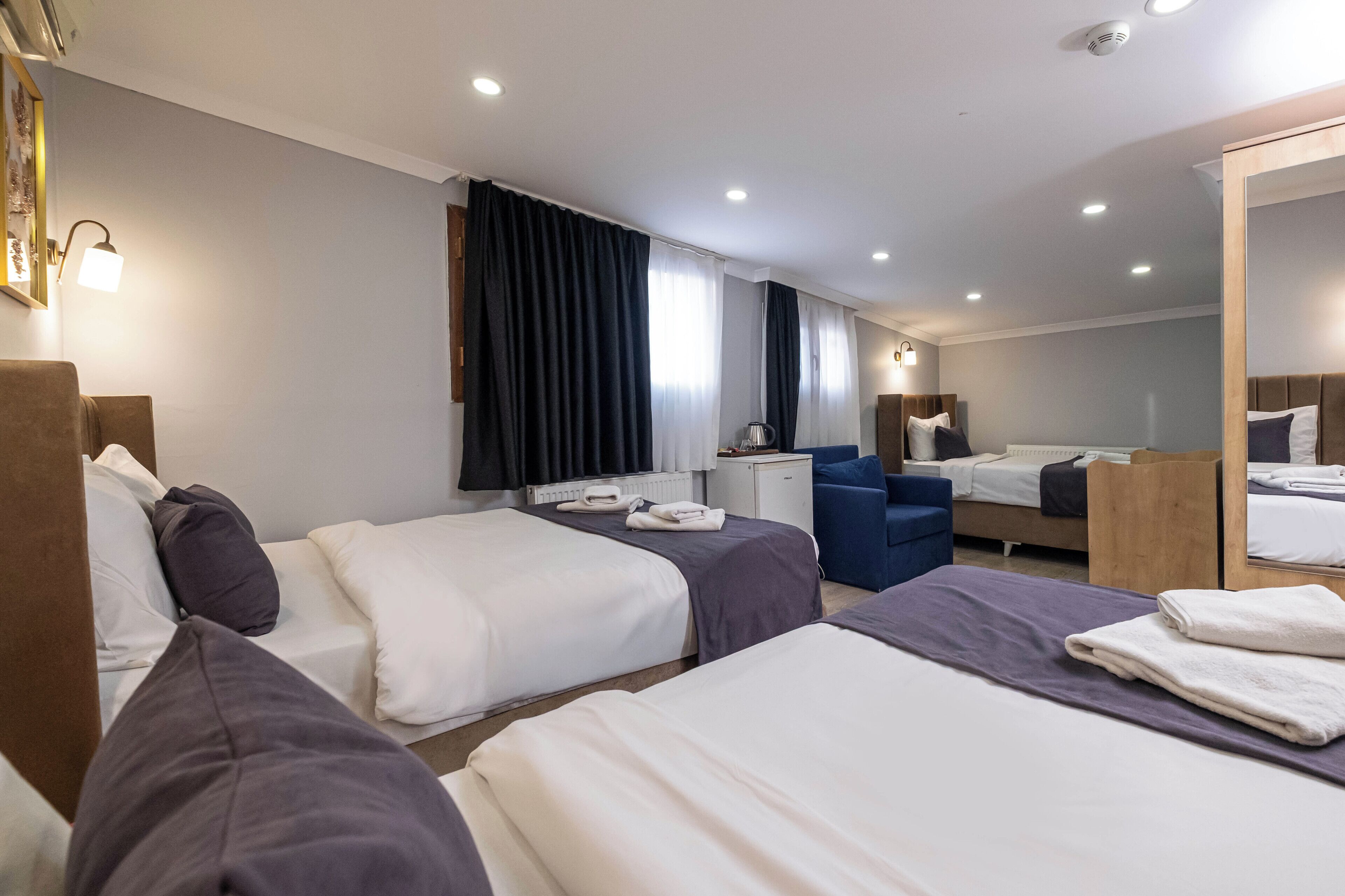 Economy Family Room | Egyptian cotton sheets, premium bedding, pillowtop beds, minibar