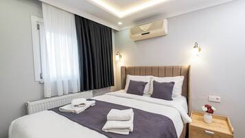 Deluxe Family Room | Egyptian cotton sheets, premium bedding, pillow-top beds, minibar