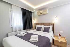 Deluxe Family Room | Sábanas de algodón egipcio y ropa de cama de alta calidad 