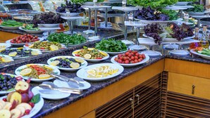 A buffet with various food items including fruits, vegetables, and salads. - Marlight Boutique Hotel - Boutique Class (Izmir)