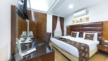 Habitación individual estándar | Ropa de cama de alta calidad, minibar, caja fuerte