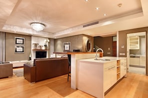 Three-Bedroom Exclusive Penthouse | Living room | TV