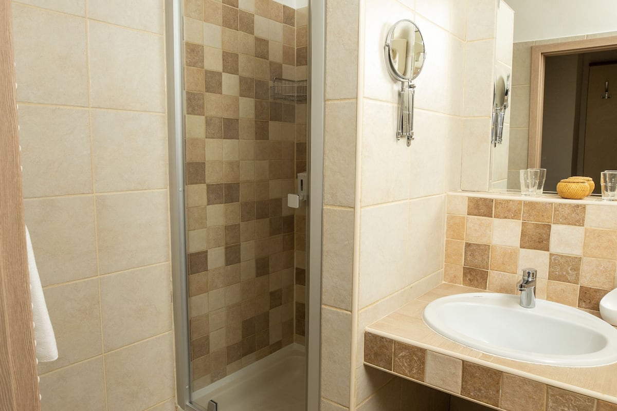 double or twin room | bathroom | shower, free toiletries, hair dryer, bathrobes