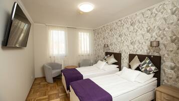 Double or Twin Room | Minibar, desk, blackout drapes, iron/ironing board