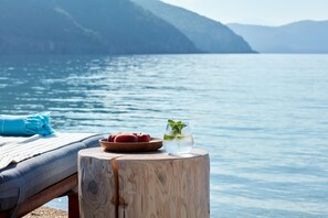 On the beach, sun loungers, beach umbrellas, scuba diving