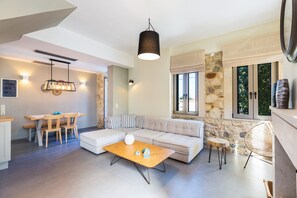 Family Villa, 2 Bedrooms, Sea View | Living area | 43-inch flat-screen TV with satellite channels