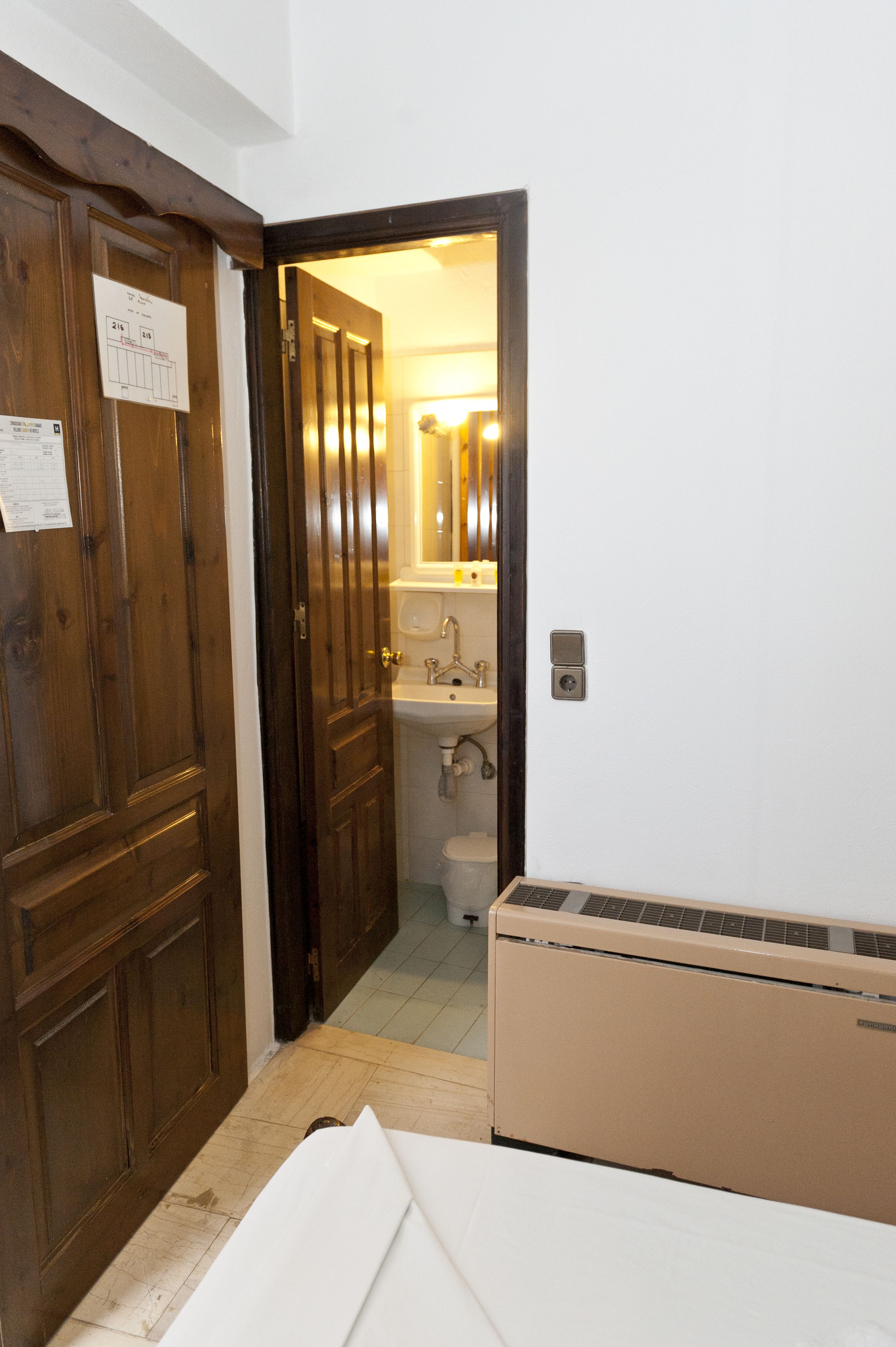 single room | bathroom | deep-soaking bathtub, rainfall showerhead, towels