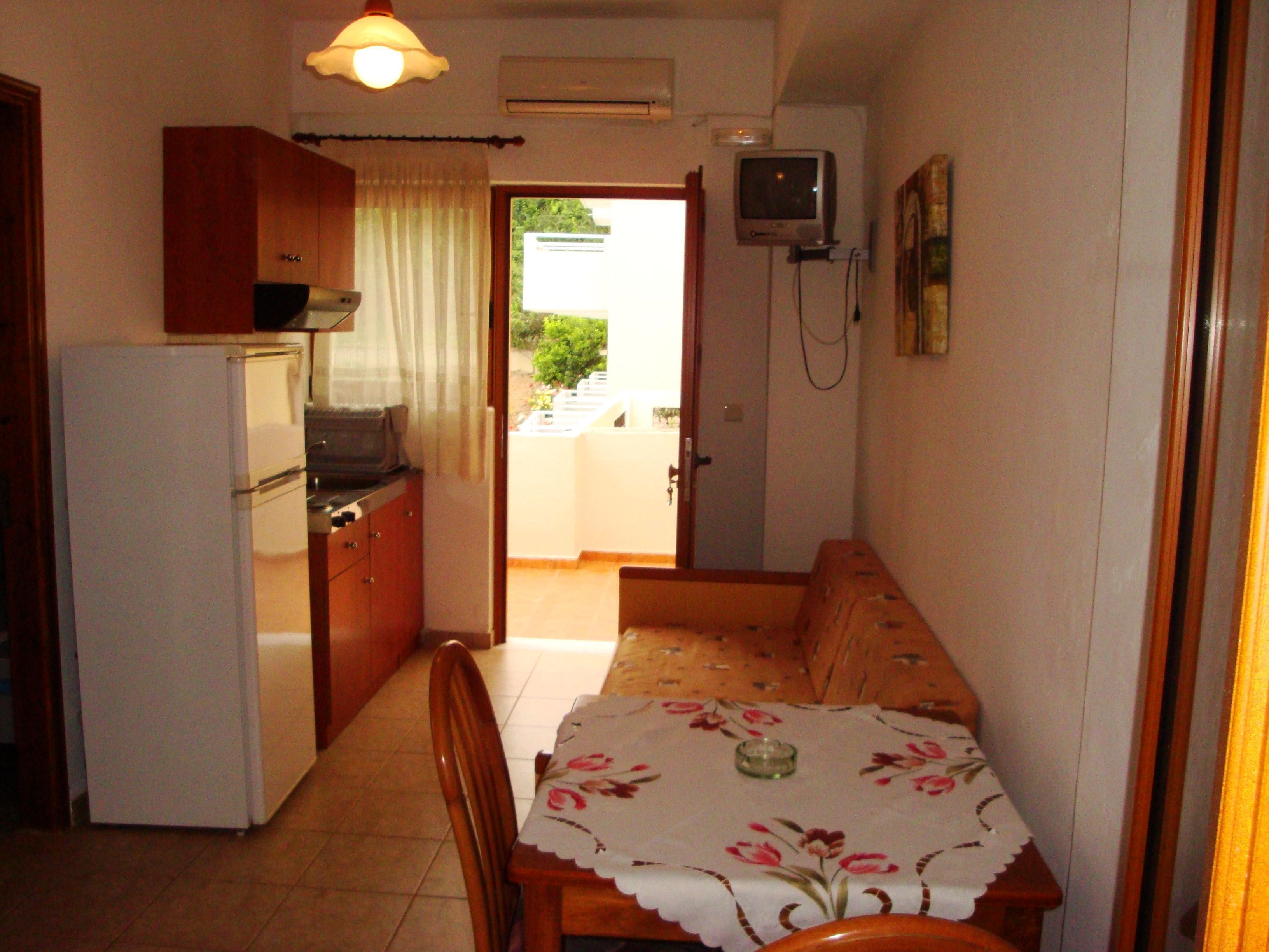 fridge, coffee/tea maker, cookware/dishes/utensils