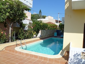 Outdoor pool, pool umbrellas, pool loungers