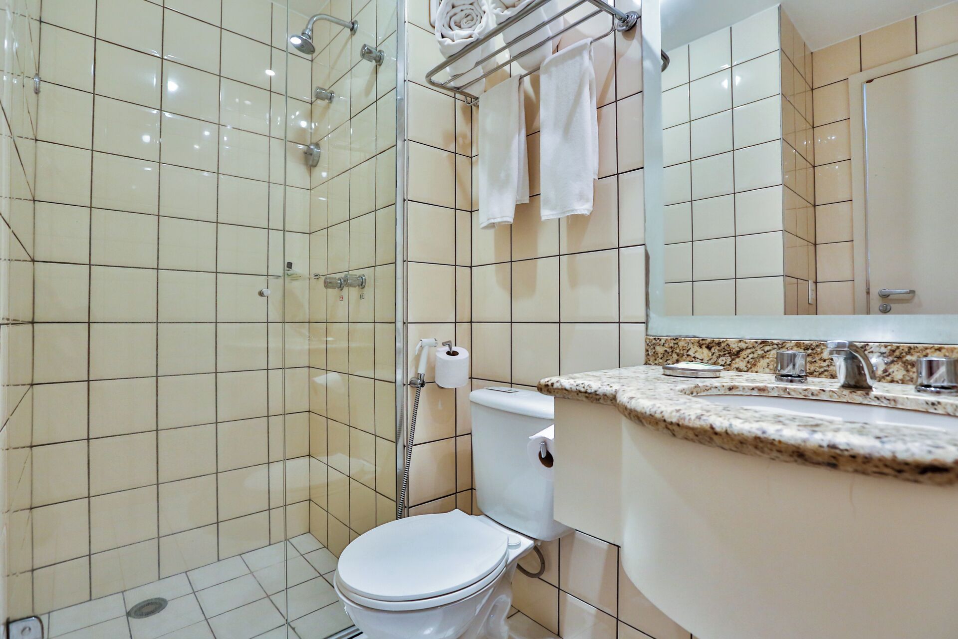 standard suite, 1 king bed | bathroom | shower, free toiletries, hair dryer, towels