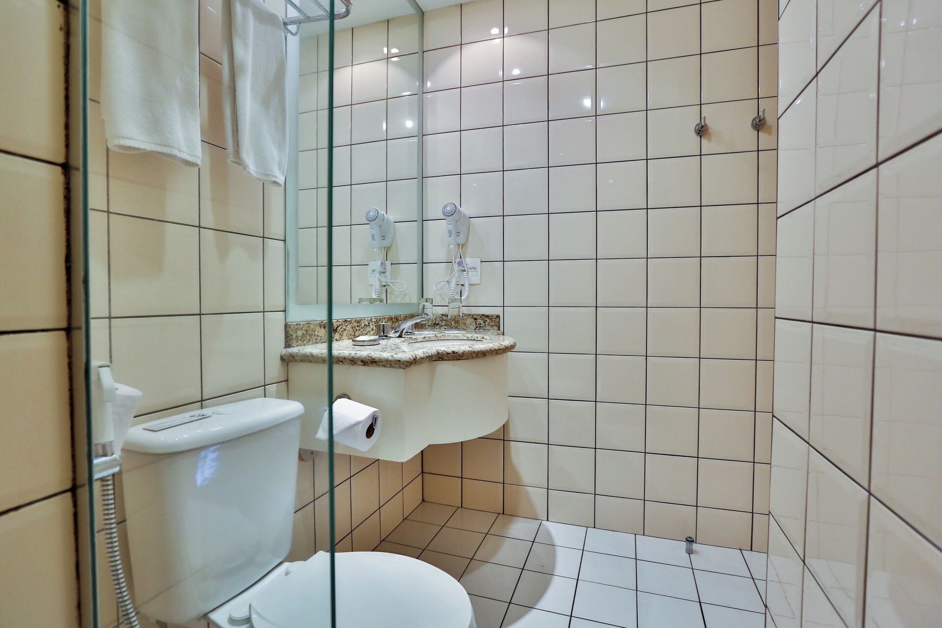 standard suite, 1 king bed | bathroom | shower, free toiletries, hair dryer, towels