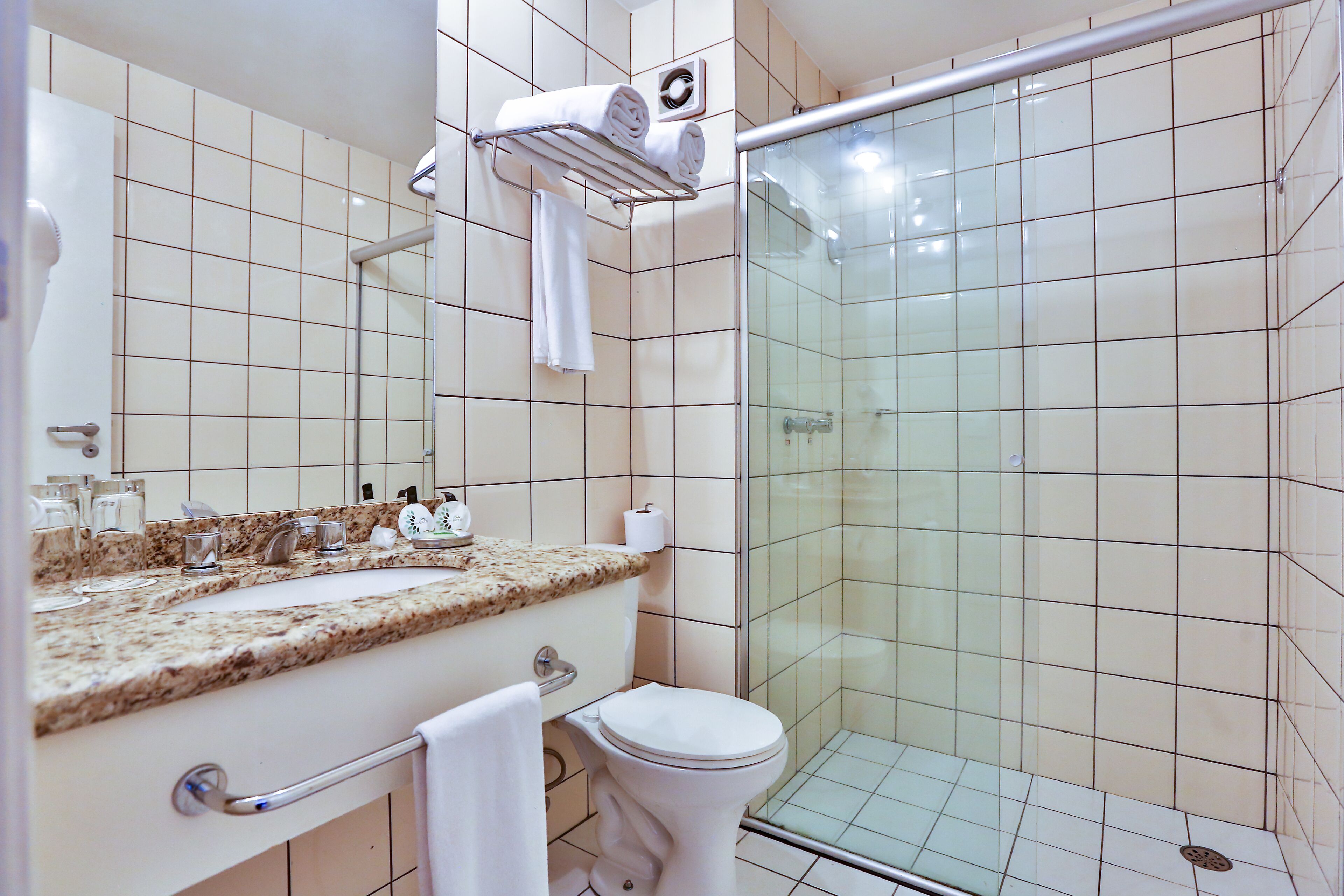 deluxe suite, 1 king bed | bathroom | shower, free toiletries, hair dryer, towels