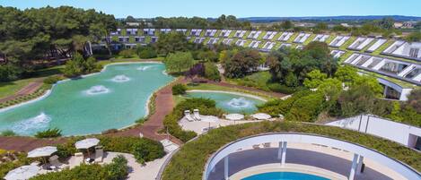 Outdoor pool, pool umbrellas, sun loungers