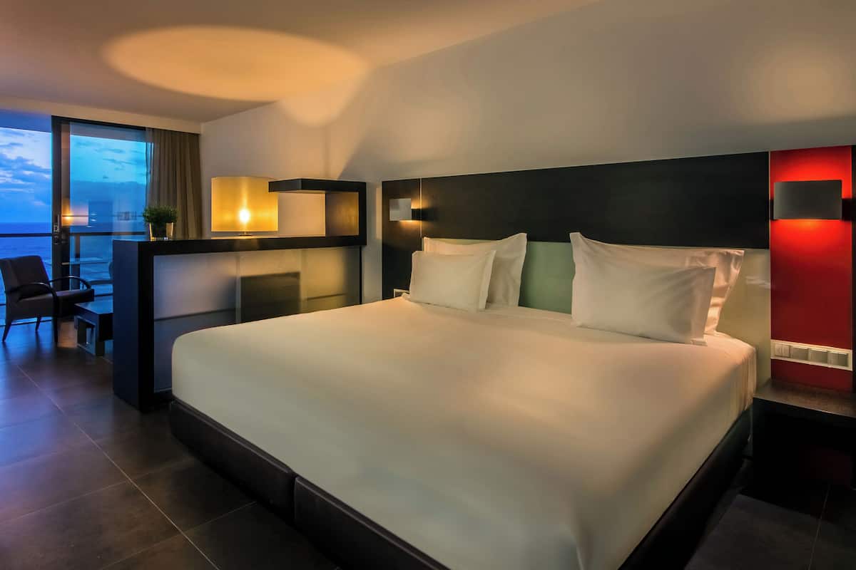 Pillow-top beds, minibar, in-room safe, blackout curtains